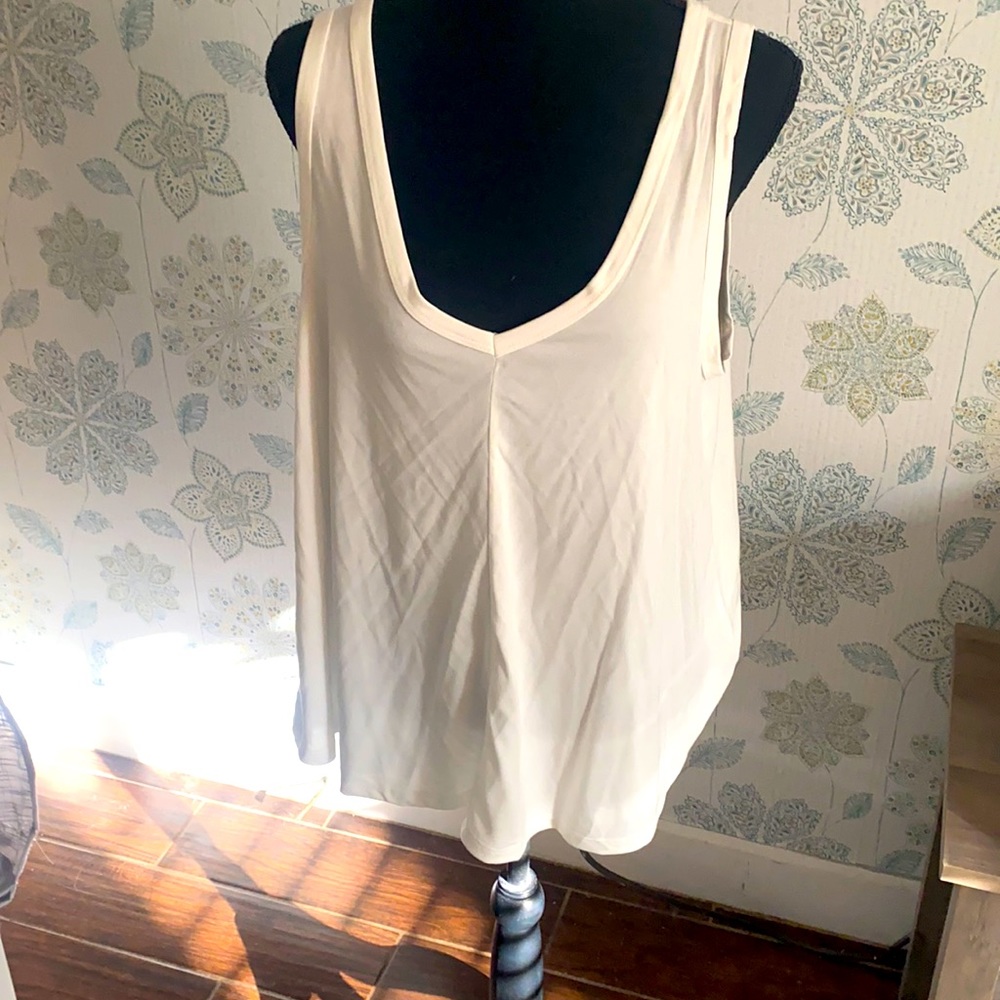 Lush wowens sleeveless flowy top.  Size large, like new condition